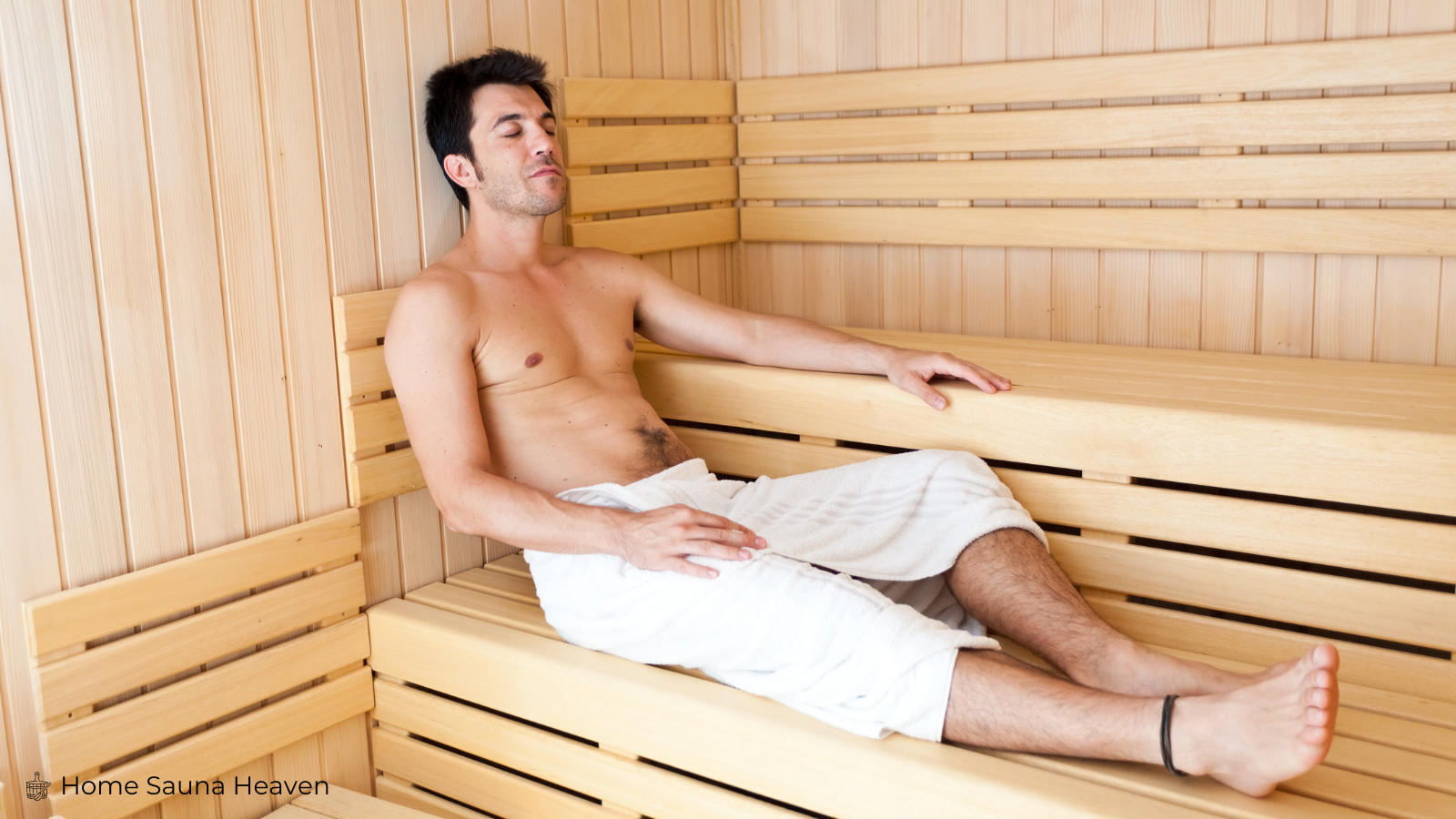 man sitting in a sauna