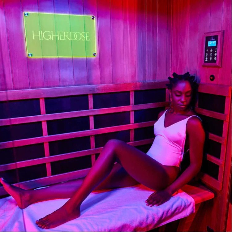 lady relaxing in the higherdose full spectrum infrared sauna