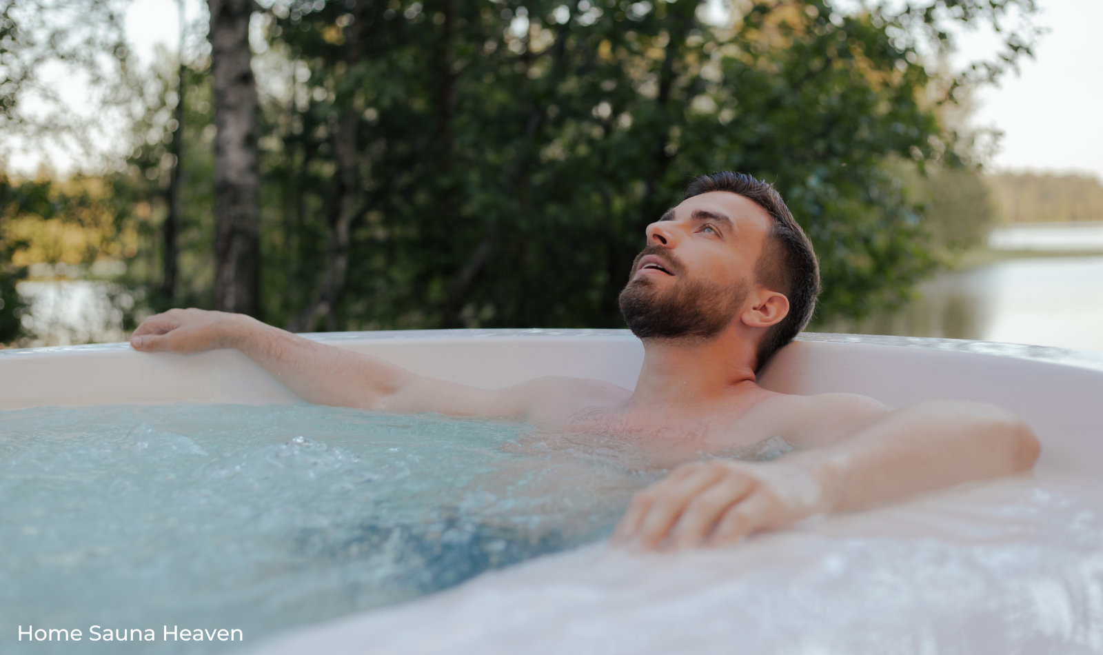 man relaxing in a white hot tub