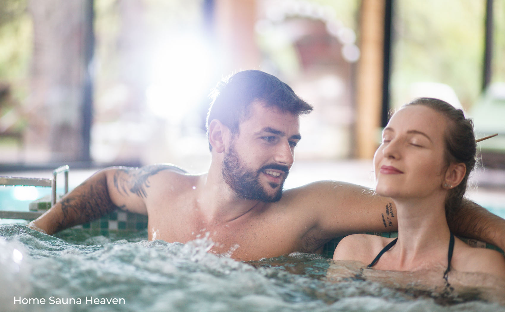 man and a woman relaxing in a hot tub